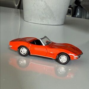 Johnny Lighting? orange corvette stingray die cast car matchbox?